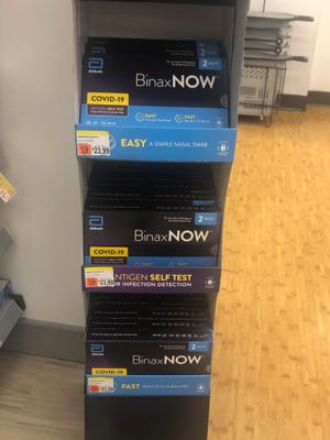 At-home COVID tests for sale at a drugstore. The CDC now allows at-home tests to be used to meet its requirement of a negative test before boarding international flights to the United States.