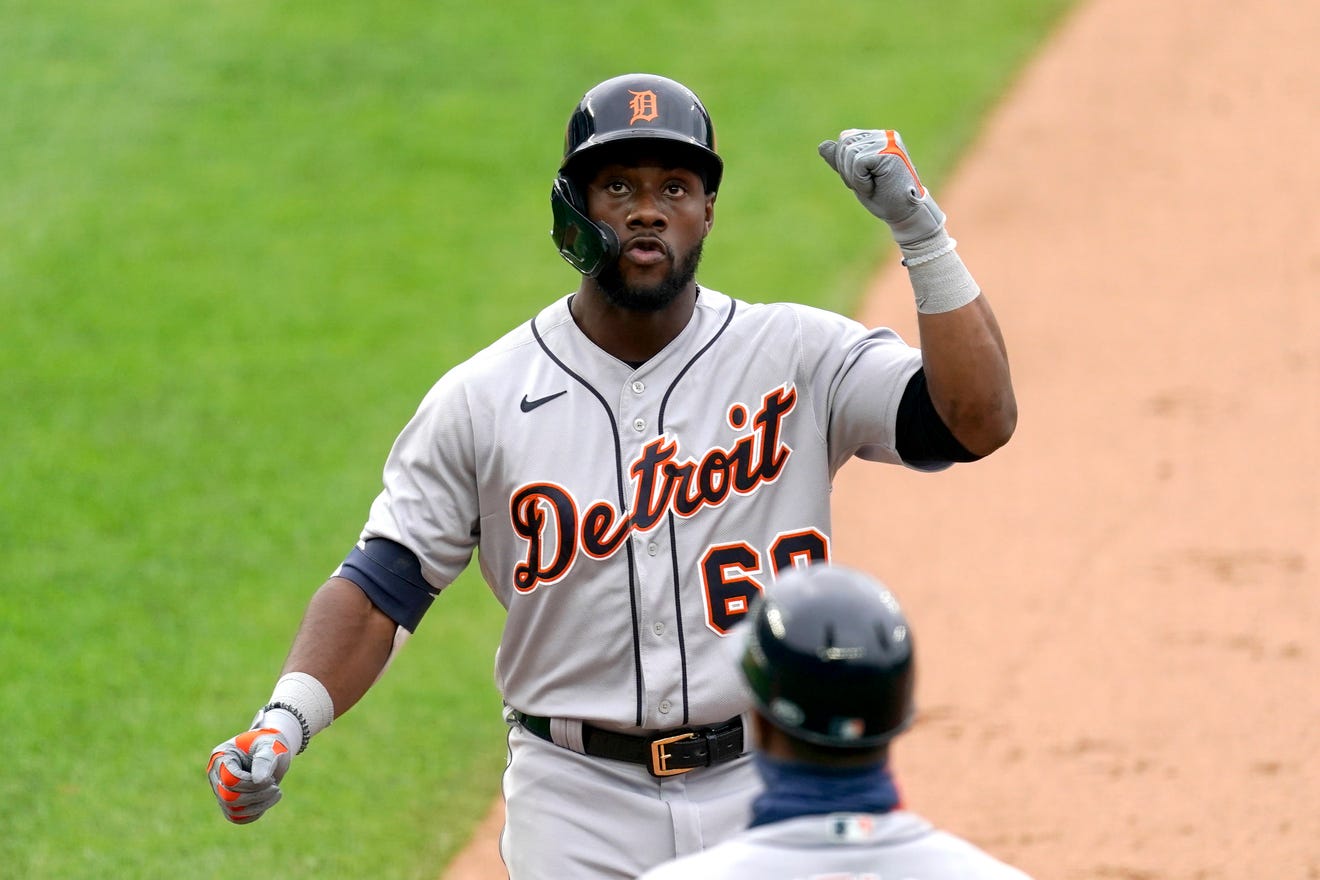 Detroit Tigers' Akil Baddoo celebrates on first after hitting a two-run single during the second inning on Monday against the Brewers.