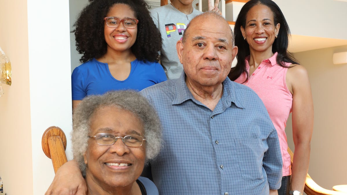 Marsha and Joseph Hardin, the parents of Alena Shifrin, right, are pictured with Kayla Hardin, 20, left and Serena Shifrin, 16, top, May 21, 2021, in the new home that Alena and her husband Seth purchased in March. The intergenerational family moved into a larger home with more space and better Internet.