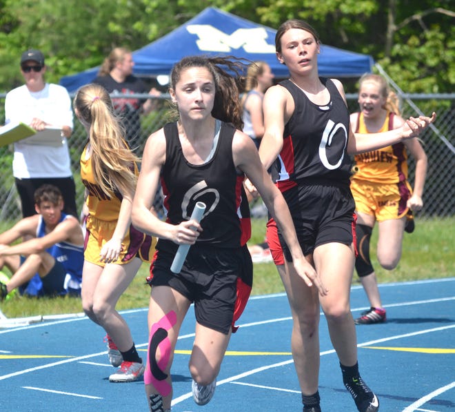 Onaway's Madilyn Crull runs the final leg of the girls 400 relay at a Division 4 regional track and field meet held in Indian River on Saturday.