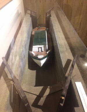 An exhibit at Wm. McKinley Presidential Library & Museum shows visitors how canal boats in the middle of the 1800s used "locks" in canals to get through areas of uneven elevation. CantonRep.com / Gary Brown