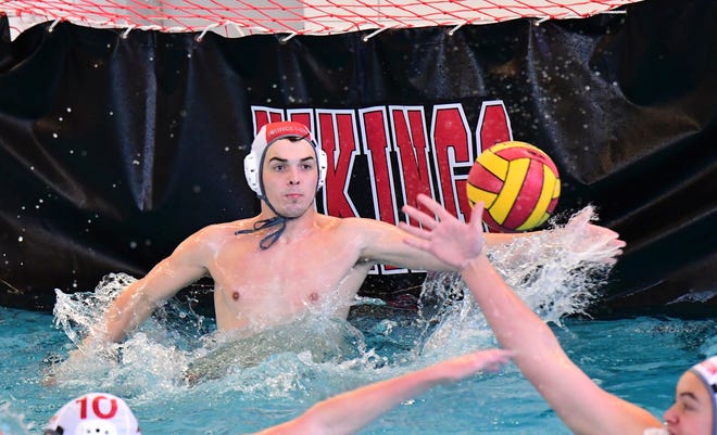 Princeton goalkeeper Kyle McDaniel makes a save in goal at the 2021 Ohio Boys State Water Polo Championship, May 22, 2021.