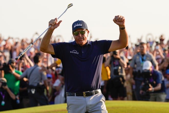 Phil Mickelson celebrates after winning the final round at the PGA Championship golf tournament on the Ocean Course, Sunday, May 23, 2021, in Kiawah Island, S.C.