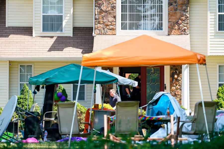 Investigators works the scene of a shooting in Fairfield Township, N.J., Sunday, May 23, 2021. (AP Photo/Matt Rourke) ORG XMIT: NJMR110