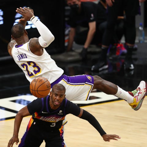Los Angeles Lakers forward LeBron James falls over