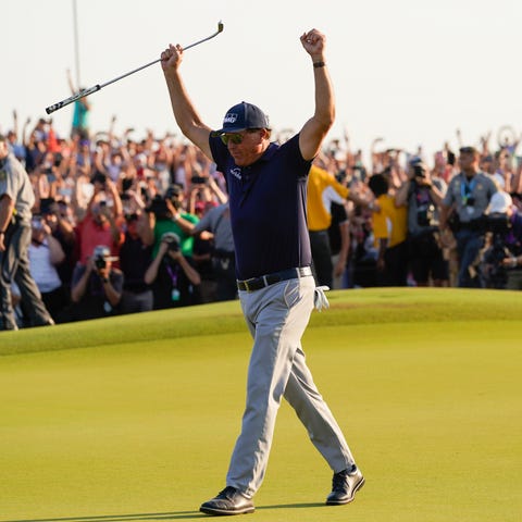 Phil Mickelson celebrates after winning the PGA Ch