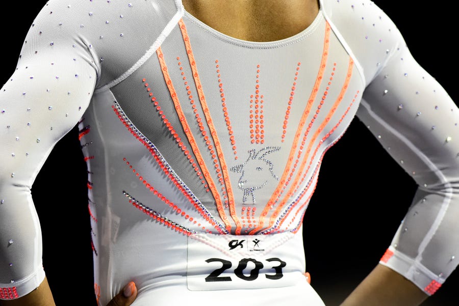 Simone Biles wears a rhinestone goat on her leotard during the 2021 GK U.S. Classic gymnastics competition.