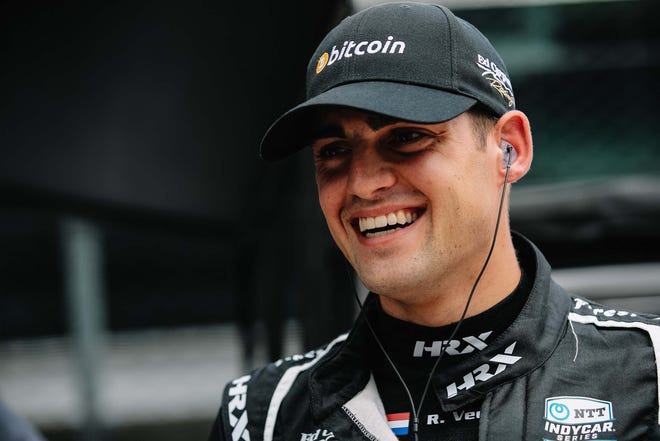 Twenty-year old Dutchamn Rinus Veekay is all smiles after qualifying his #21 Bitcoin Chevrolet third for the Indy 500.