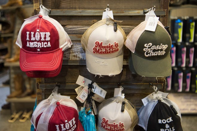 Hats hang at Boot Barn, located at 112 Walker Springs Road in West Knoxville, Friday, May 21, 2021. Boot Barn, which operates over 250 locations in 30 states, opened its newest Knoxville location in March.