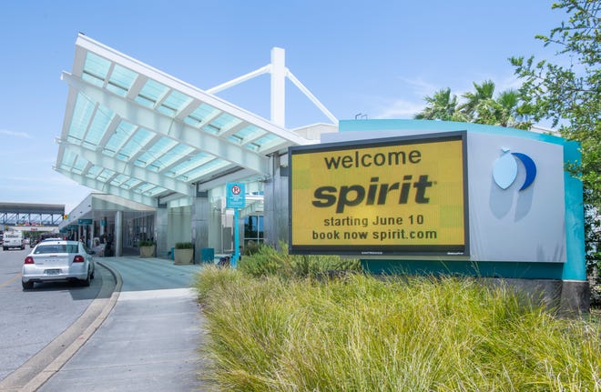 A sign outside the Pensacola International Airport on Monday announces that Spirit Airlines will start service at the airport beginning June 10.