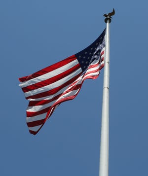 The American Flag flies over the Delaware War Memorial near New Castle.