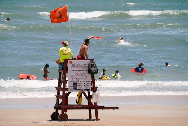 Lifeguards keep watch over the shoreline in Ormond Beach this week, ahead of the Memorial Day weekend holiday. Hotels and other tourist-reliant businesses expect to be busy this weekend, as coronavirus restrictions continue to ease and travelers again take vacations. Looking ahead, it is expected to be busy summer, said Bob Davis, president and CEO of the Lodging & Hospitality Association of Volusia County.