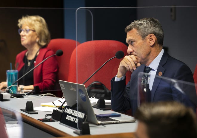 Rep. Aaron Lieberman, D-Paradise Valley and Rep. Judy Schwiebert, D-Phoenix, look on during debate of HB 2898, a K-12 education bill, during the House Appropriations Committee hearing at the Arizona Capitol in Phoenix on May 25, 2021.