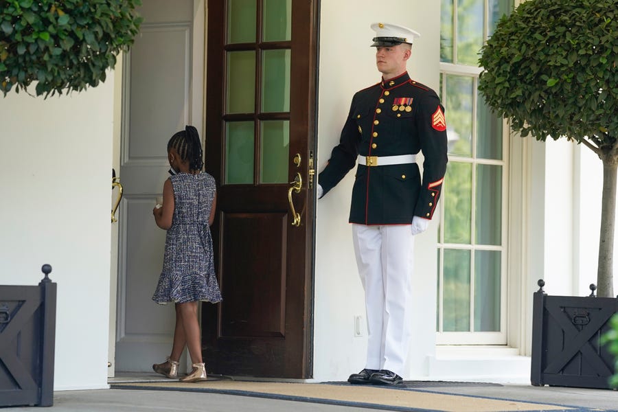 Gianna Floyd, the daughter of George Floyd, walks into the West Wing at the White House, Tuesday, May 25, 2021, in Washington. Members of the Floyd family were meeting with President Joe Biden.