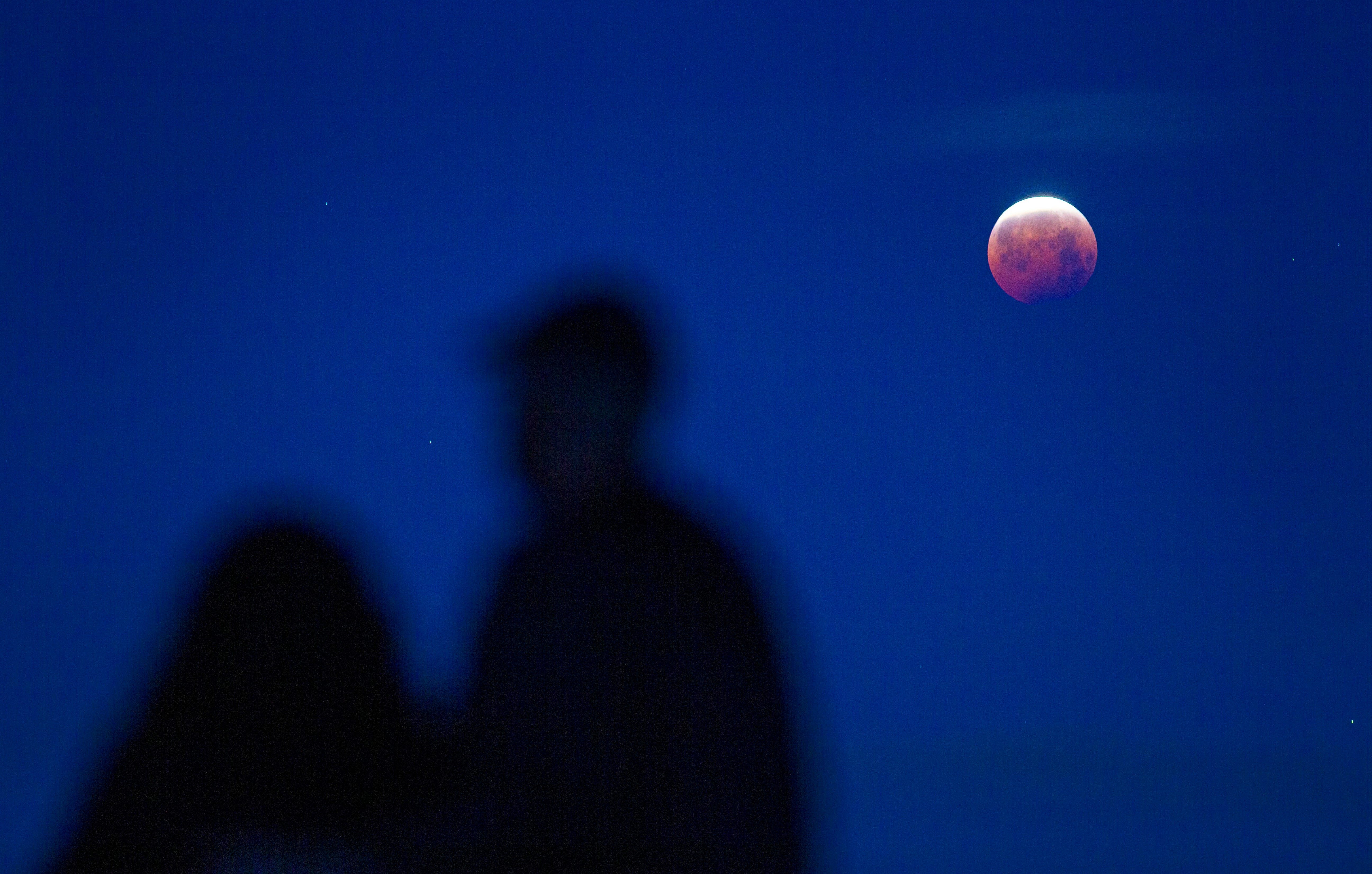 'Super flower blood moon' to be visible Sunday. Here's how to watch.