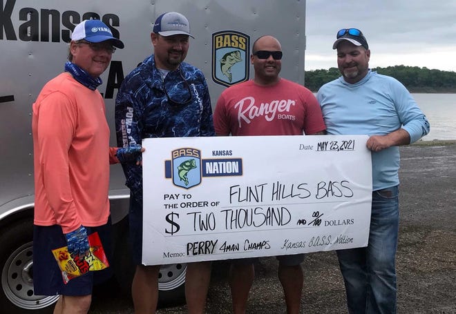 From left, Berryton's Mike Turner stands with Topeka's Tate Herrman, Nick Butler and Richard Heflin behind their $2,000 check for winning the Kansas BASS Nation 4-Man event May 22-23 on Perry Reservoir.