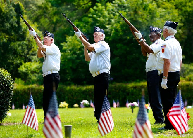 Korean War Veterans fires off a rifle salute during the annual Memorial Day ceremony held at the Veteran's Memorial at Forest Meadows Cemetery East in Gainesville in 2019.