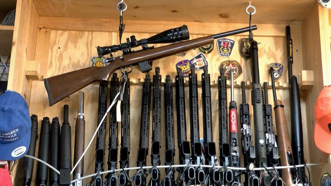 A rack of rifles are shown inside a New Jersey gun shop in July 2020. A two-year set of Alcohol, Tobacco, Firearms and Explosives records found many of the weapons dealers recommended to lose their licenses instead kept them. The New Jersey shop was not cited in the records reviewed by reporters. (Thomas P. Costello/Asbury Park Press)