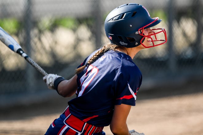 Lakewood's Cora Giffin drives in a run against Holt in the third inning on Wednesday, May 26, 2021, during the Softball Classic semifinal at Ranney Park in Lansing. 