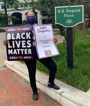 Tracey Thou, a member of Service Employees International Union and a Wilmington resident, is advocating for a $15 minimum wage in Delaware.