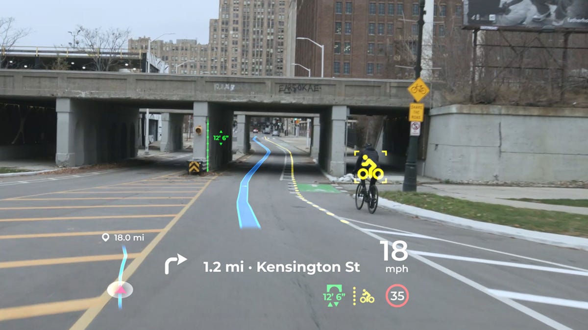 An augmented reality windshield under development by Panasonic Automotive would project directions onto the road, display vehicle information like speed and identify other objects in view, such as bicyclists.