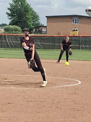 Cardington's Genevieve Longsdorf delivers a pitch during last year's regional tournament at Elida. She helped the Pirates to an undefeated start to the season, playing four games in Florida last week.