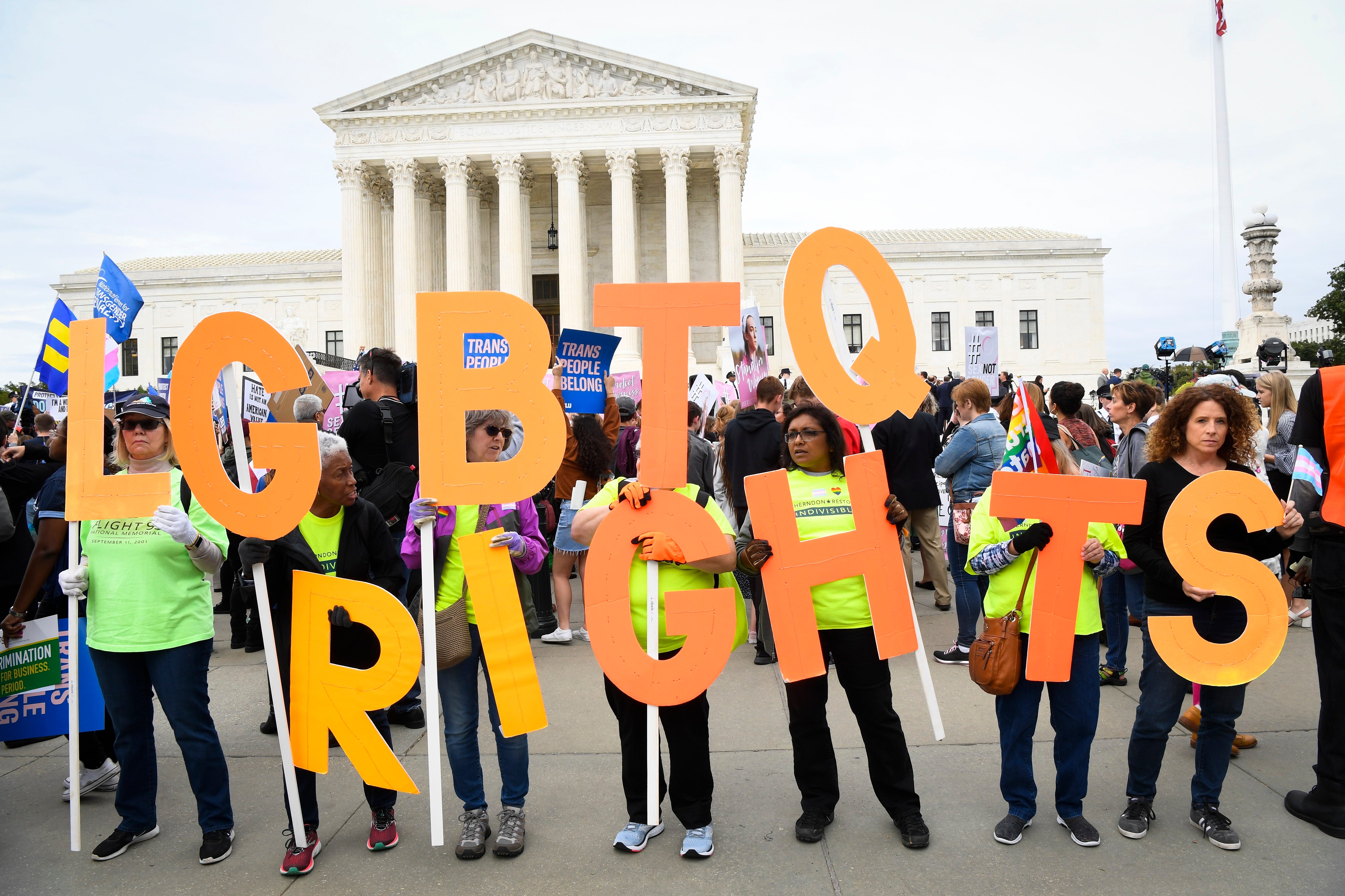 10/8/19 12:40:11 PM --   -- Protestors and supporters gather in front of the U.S. Supreme Court on Oct. 8, 2019 in Washington as the justices hear three challenges from New York, Michigan and Georgia involving workers who claim they were fired because they were gay or transgender. --    Photo by Jack Gruber, USA TODAY Staff ORG XMIT:  JG 138297 SCOTUS_LGBTQ 10/8/201 [Via MerlinFTP Drop]