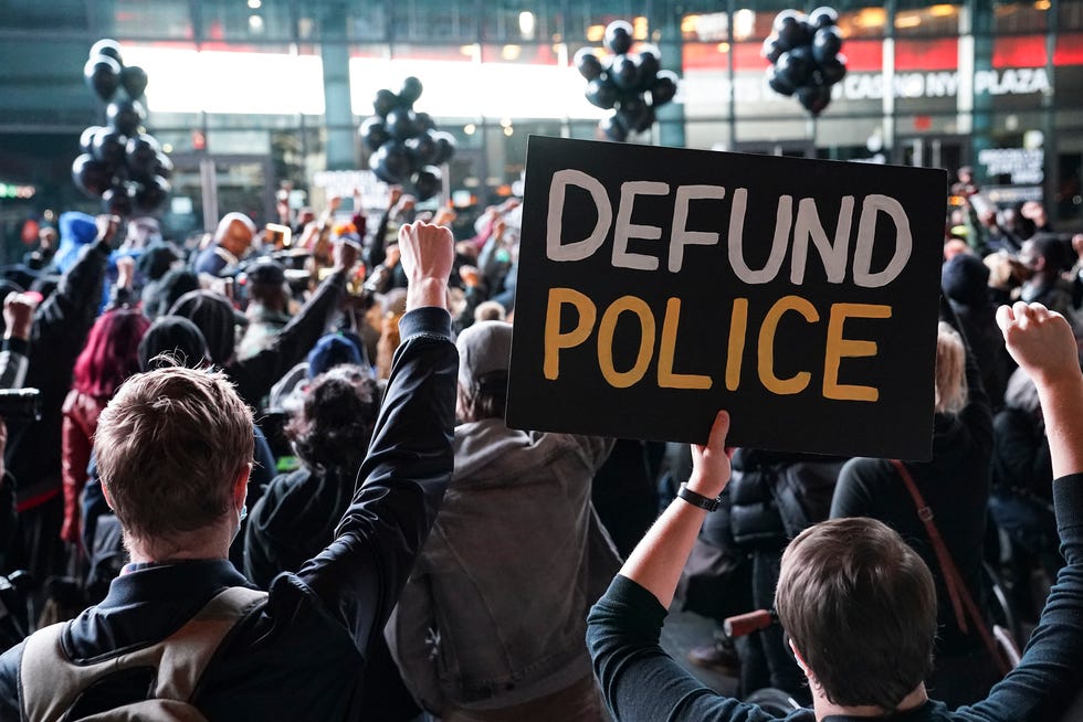 A protester demands the defunding of police during a rally for the late George Floyd outside Barclays Center on Oct. 14, 2020, in New York. Demonstrators gathered on what would have been Floyd's 47th birthday to call for action in correcting systemic racism in policing and criminal justice.