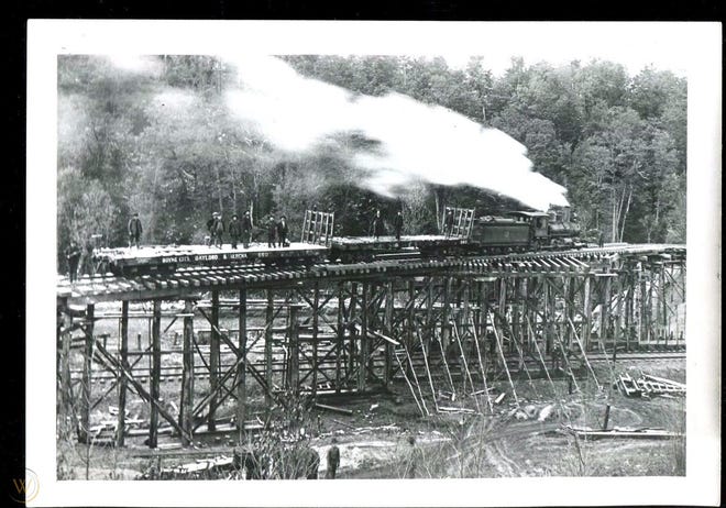 A typical train of the day, the Boyne City, Gaylord, Alpena railroad. Actual pictures of the Cheboygan Railroad Fight by the same photographer, T.C. Stoner, may exist in a box in the Bentley Historical Archives at University of Michigan.