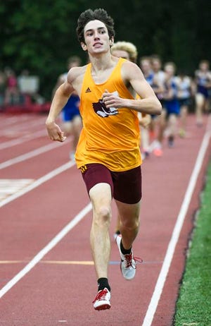 Bloomington North's Mason Childers wins the 800 meter run with teammate Griffin Bruce not far behind in second during the IHSAA boys' track and field regional at Bloomington North Thursday, May 27, 2021. (Bobby Goddin / Herald-Times)