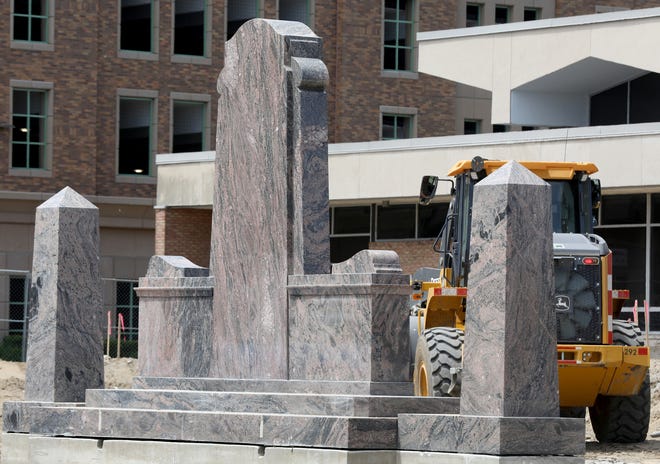 Photos shows the Royal Oak War Memorial on May 27, 2021, one day after it was moved 40 feet. The move was opposed by veterans groups. They sued the city on May 25 to force a proposal onto November ballots. On July 30, 2021 the Michigan Court of Appeals affirmed their right to have voters see the proposal. It would put the memorial back where it was.