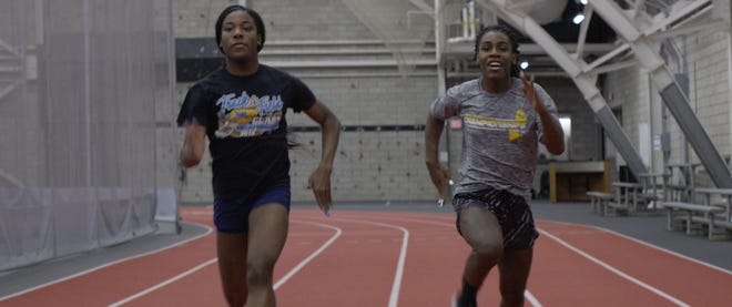 Andraya Yearwood (right) and teammate Terry Miller (left).