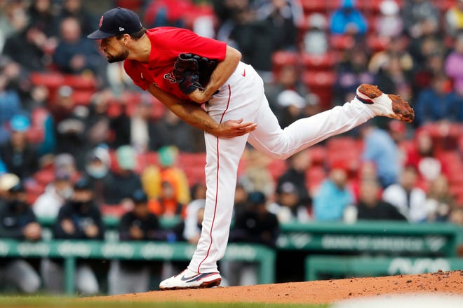 Red Sox starter Nathan Eovaldi fires a pitch during the first inning of Saturday's game against the Miami Marlins at Fenway Park.