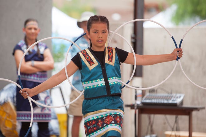 Community members gather in the Kayenta Art Village for the annual Festival of the Americas Saturday, May 29, 2021. The event aims to celebrate Indigenous and Hispanic cultures through art, dance and food. 