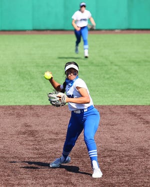 Georgetown shortstop Isa Torres fires fires to first base for an out in the decisive third game against Leander in the Class 5A Region IV championship series Saturday at Concordia University. Georgetown won both games Saturday to advance to the state tournament.