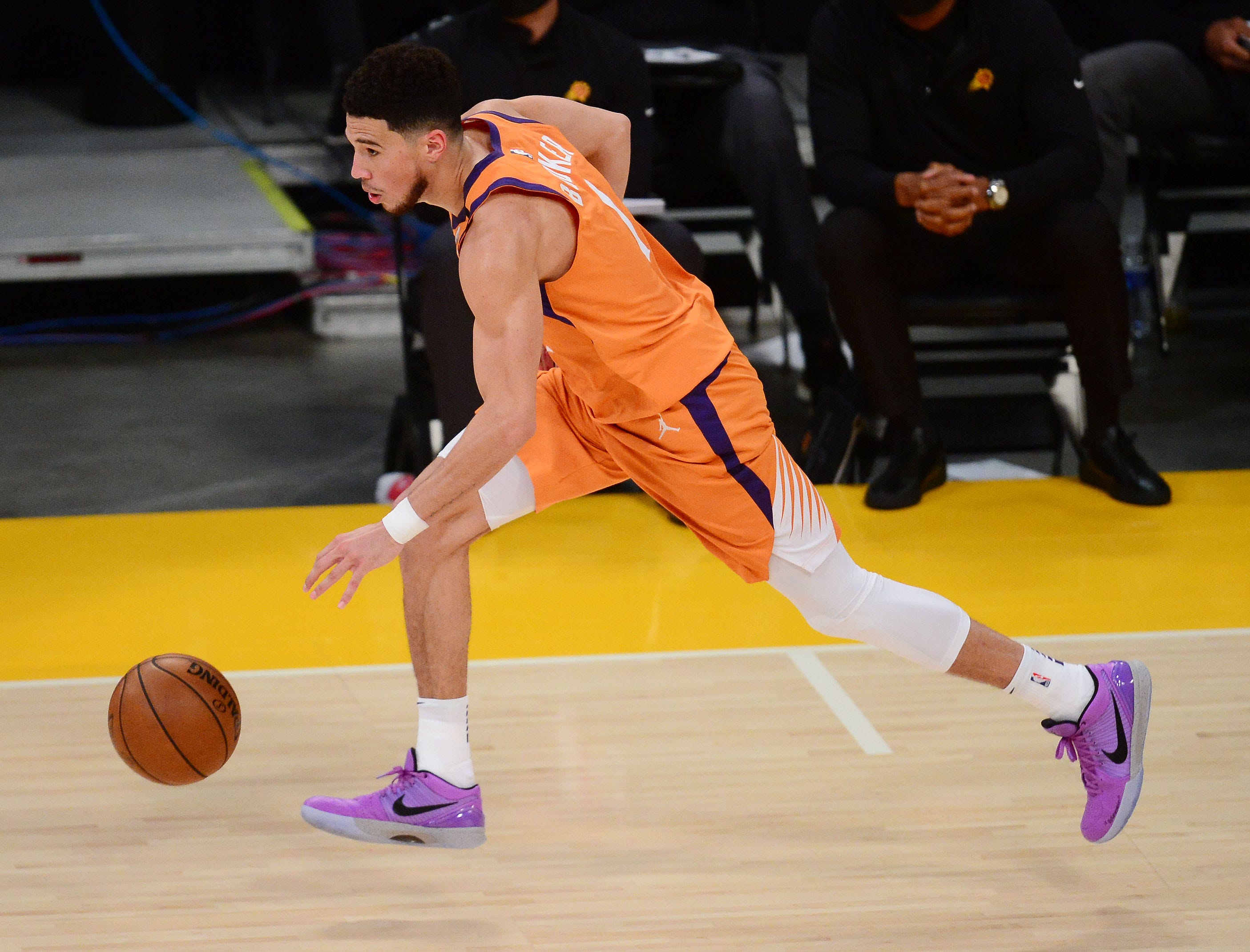 Devin Booker supports Mamba and Mambacita Foundation with gear