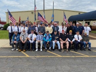 Logan County veterans pose for a photo after the 2021 Memorial Day ceremony in Lincoln.