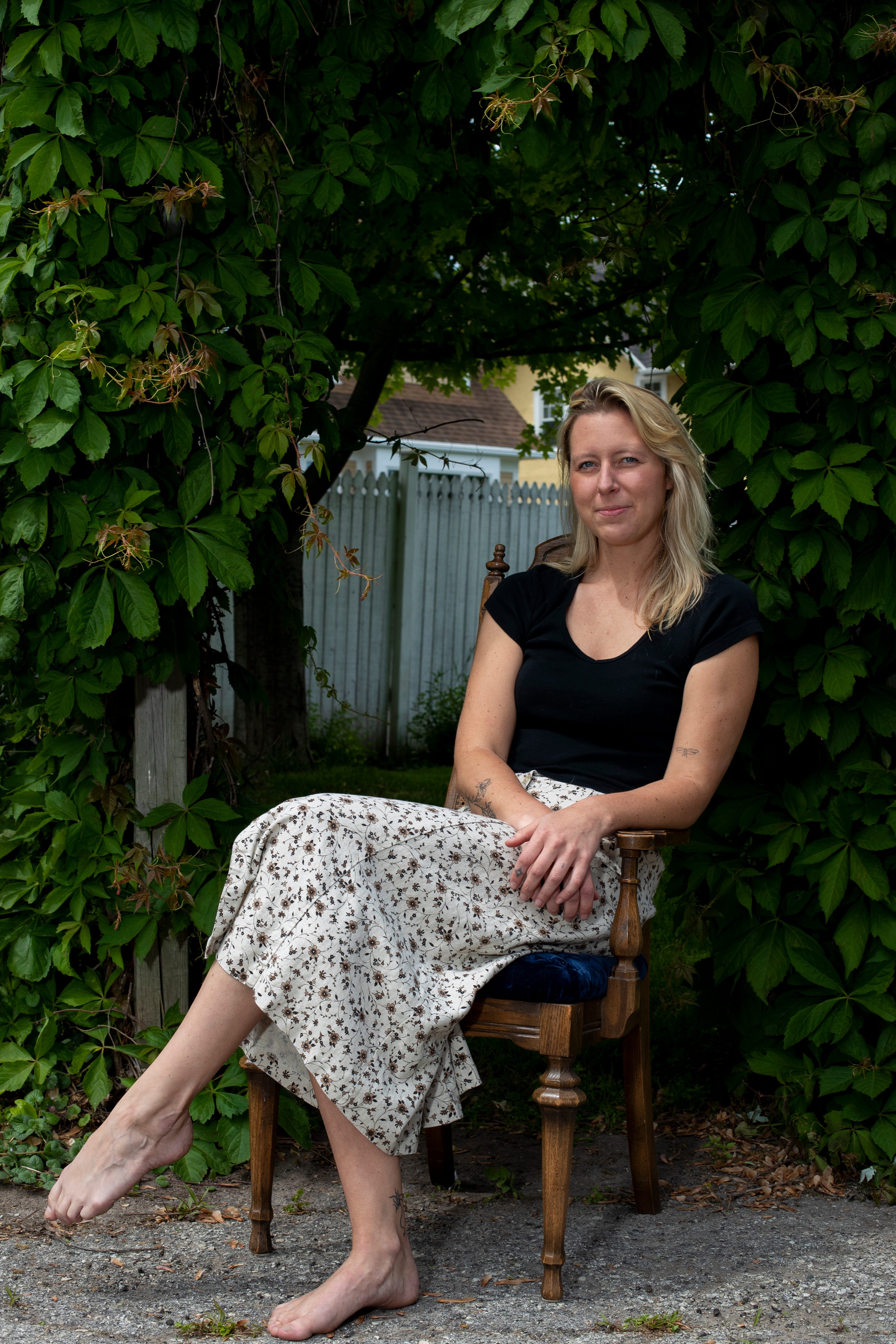 Paige Grube poses for a portrait at her home in Green Bay. Grube recently ended a long search for an affordable apartment.