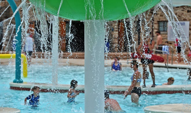 People take advantage of the reopening of the municipal pool during the Memorial Day weekend on Sunday, May 30, 2021.