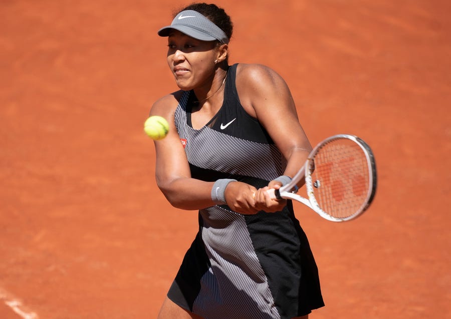 Naomi Osaka played her first-round match at the French Open on Sunday before announcing her withdrawal from the tournament on Monday.