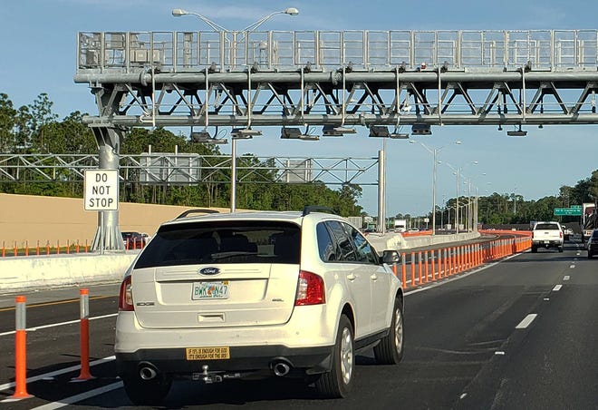 Tradespeople are often stuck in slow traffic while wealthier workers fly by in the express lanes. Why not allow them free access to those roads?