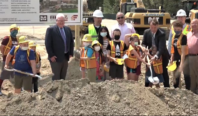 Students, town officials, school officials, and construction workers were at the official groundbreaking ceremony for the new Raymond E. Shaw Elementary School on May 19, 2021.