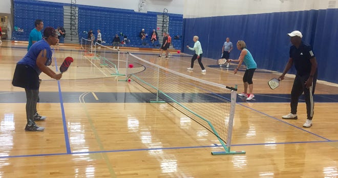 Pickleball players participate in a Granville High School fundraising campaign. Newark is seeking donations to construct dedicated pickleball courts near the ice arena.