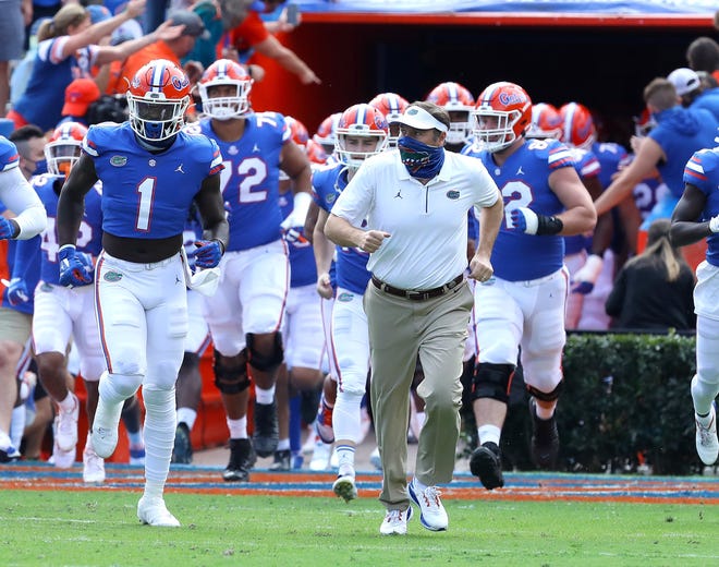 Florida coach Dan Mullen and the Gators hope wearing masks in games are a thing of the past.