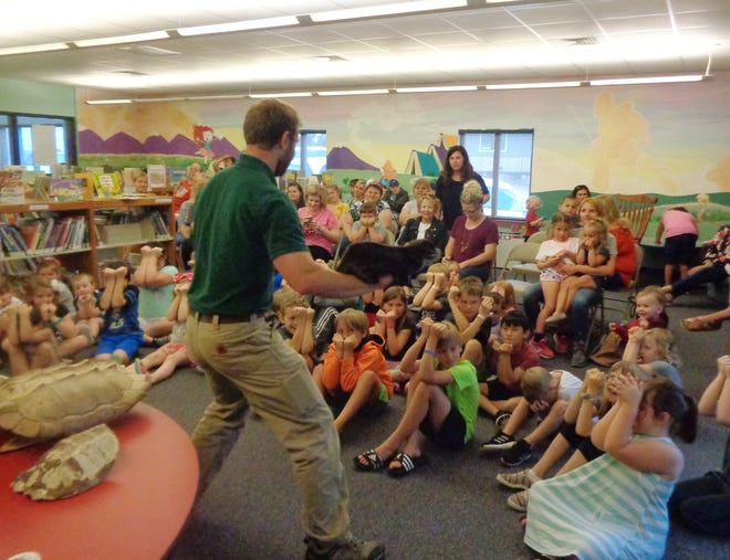 In this photo taken prior to COVID, the Missouri Department of Conservation gave a program during the summer reading program held within the Camden County Library district.