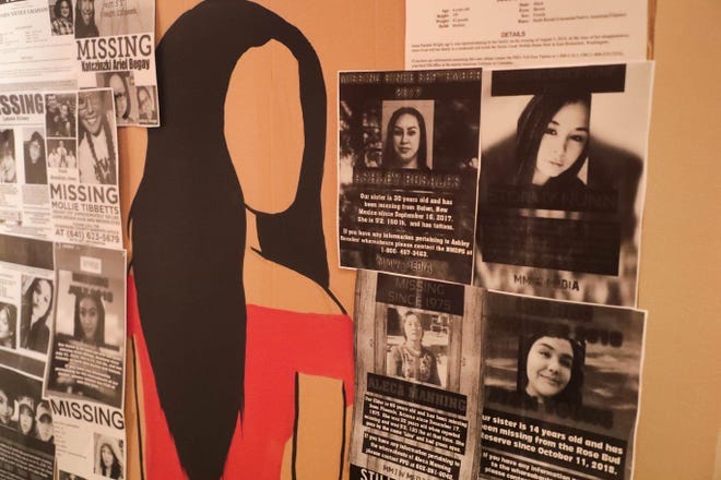 Signs hang for missing Indigenous women at Sherman Indian High School in Riverside, Calif. as part of a play in 2019.