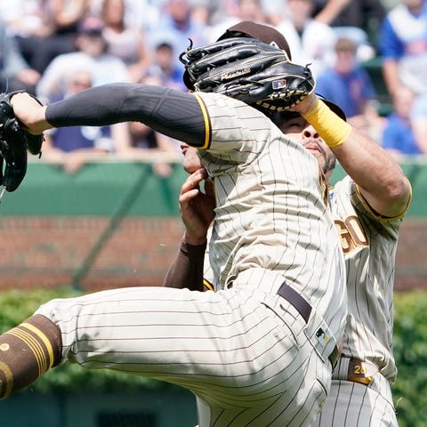 The ball drops to the ground as Padres left fielde