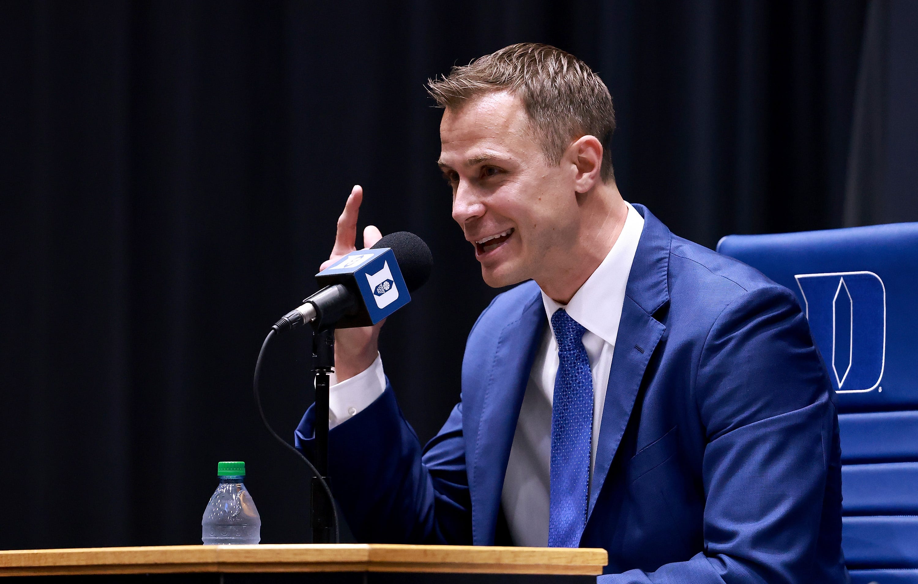 Duke's coach-in-waiting Jon Scheyer embraces following Coach K Duke's coach-in-waiting Jon Scheyer embraces following Coach K