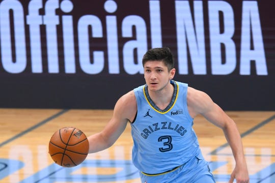 Memphis Grizzlies guard Grayson Allen (3) brings the ball upcourt against the Utah Jazz during the second half of Game 3 of an NBA basketball first-round playoff series Saturday, May 29, 2021, in Memphis, Tenn. (AP Photo/John Amis)