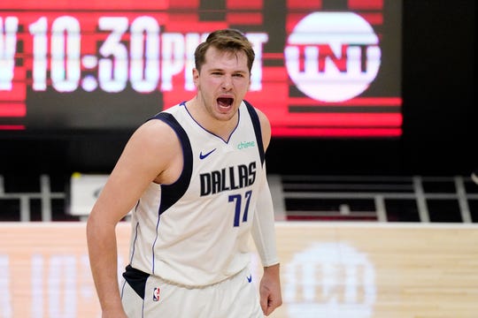 Dallas Mavericks guard Luka Doncic celebrates after they scored during the second half in Game 5 of an NBA basketball first-round playoff series against the Los Angeles Clippers Wednesday, June 2, 2021, in Los Angeles. (AP Photo/Mark J. Terrill).